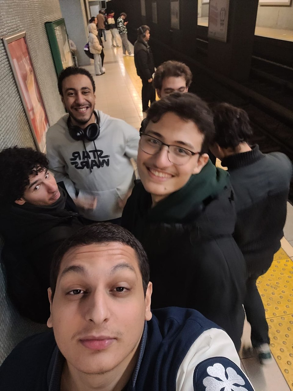 Abdullah and three friends crowded into a selfie in an Ankara metro station.